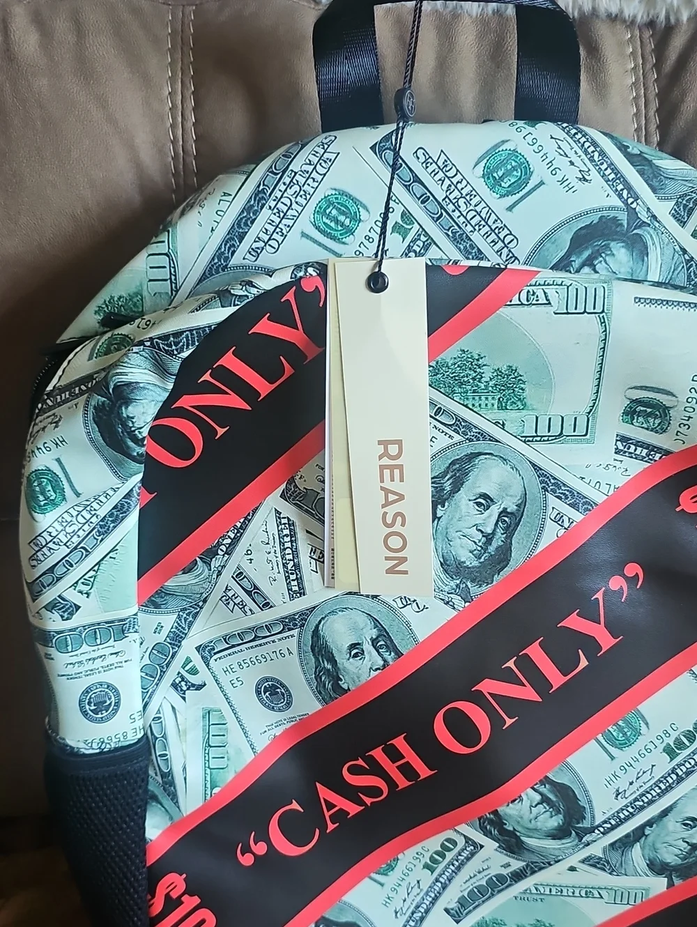 Reason Cash-Print Backpack in Green and Black with Pink Accent